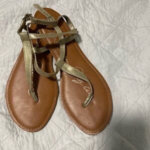 Gold and Brown Strappy Sandals with Intricate Design